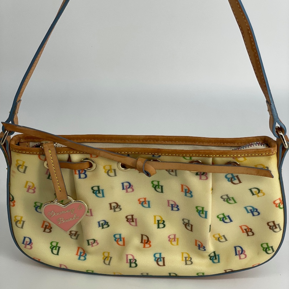 Dooney & Burke Pochette with minor water marks